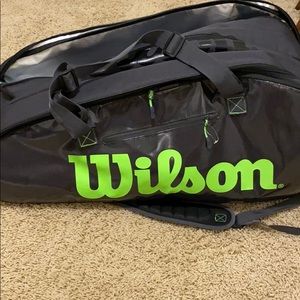 Green and Black wilson 15 pack tour bag.